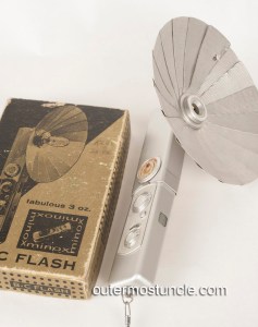 A Minox iiis Cold War era spy camera flash attachment. 