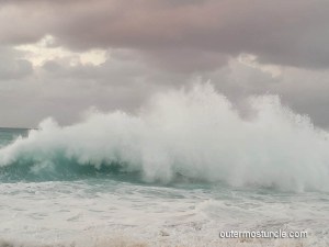 Large waves, crashing on a beach on San Salvador Island, Bahamas. In the Bermuda Triangle.