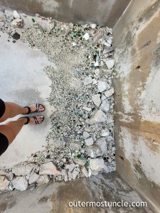 Rubble inside the weird round building. 