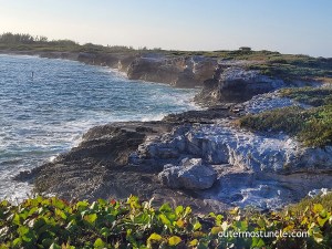 Waves crashing in the early morning on the coral cliffs of San Salvador Island, Bahamas.
