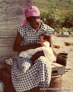A San Salvador Island woman and her baby. Photo: Bill Scales, circa 1958. This woman was later identified as Evalyn Arnette Woods her baby's name is Mavis.