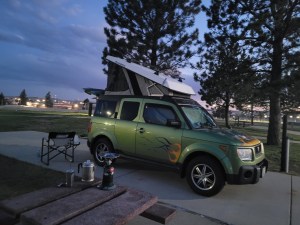 A color photo of a Honda Element Ecamper at a campsite in South Dakota.