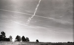 An "X" in the sky, created by jet trails.
