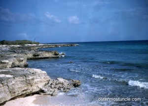 Sun shining on tropical coral cliffs. 