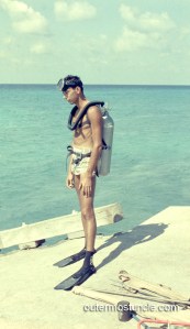 Donald Diehl suited up for SCUBA diving, 1958. In this color slide, taken by my Uncle, Don is wearing swimming trunks and a breathing tank.