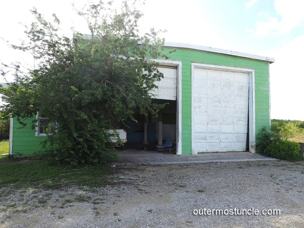 1950's vintage airport terminal, which looks more like a dilapidated garage.