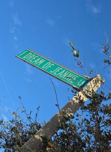 The street sign, "I Dream Of Jeannie Lane".