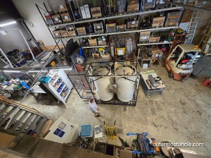 A photo from the upper floor of Copenhagen Suborbitals, looking down, showing a variety of equipment.